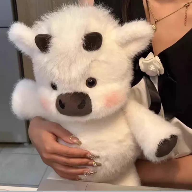 Peluche vaca peluda: Adorable juguete de peluche.