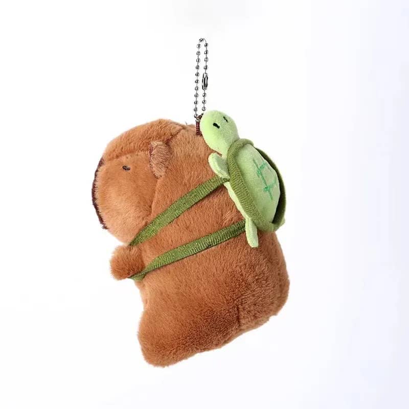 Peluche capibara pato con flotador amarillo